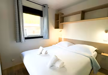 Chambre avec lit double du chalet Premium 3
